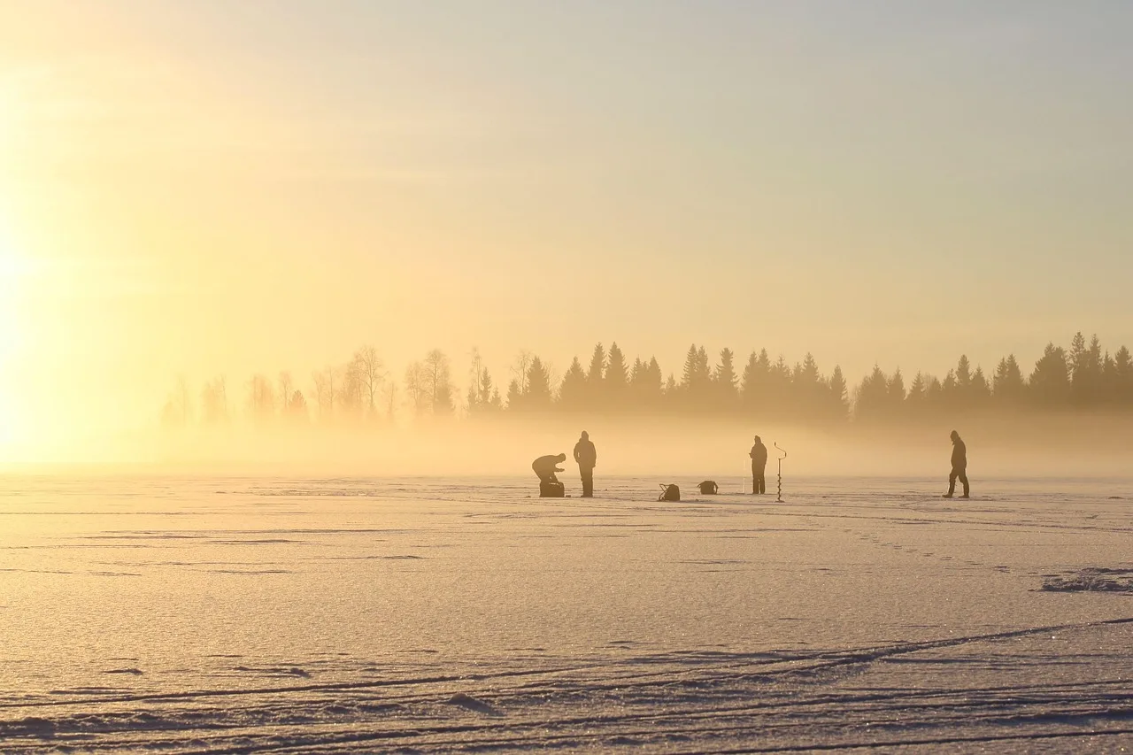 the fisherman, on ice, on a winter day. Calgary and Edmonton miniature work through dry air and long winters