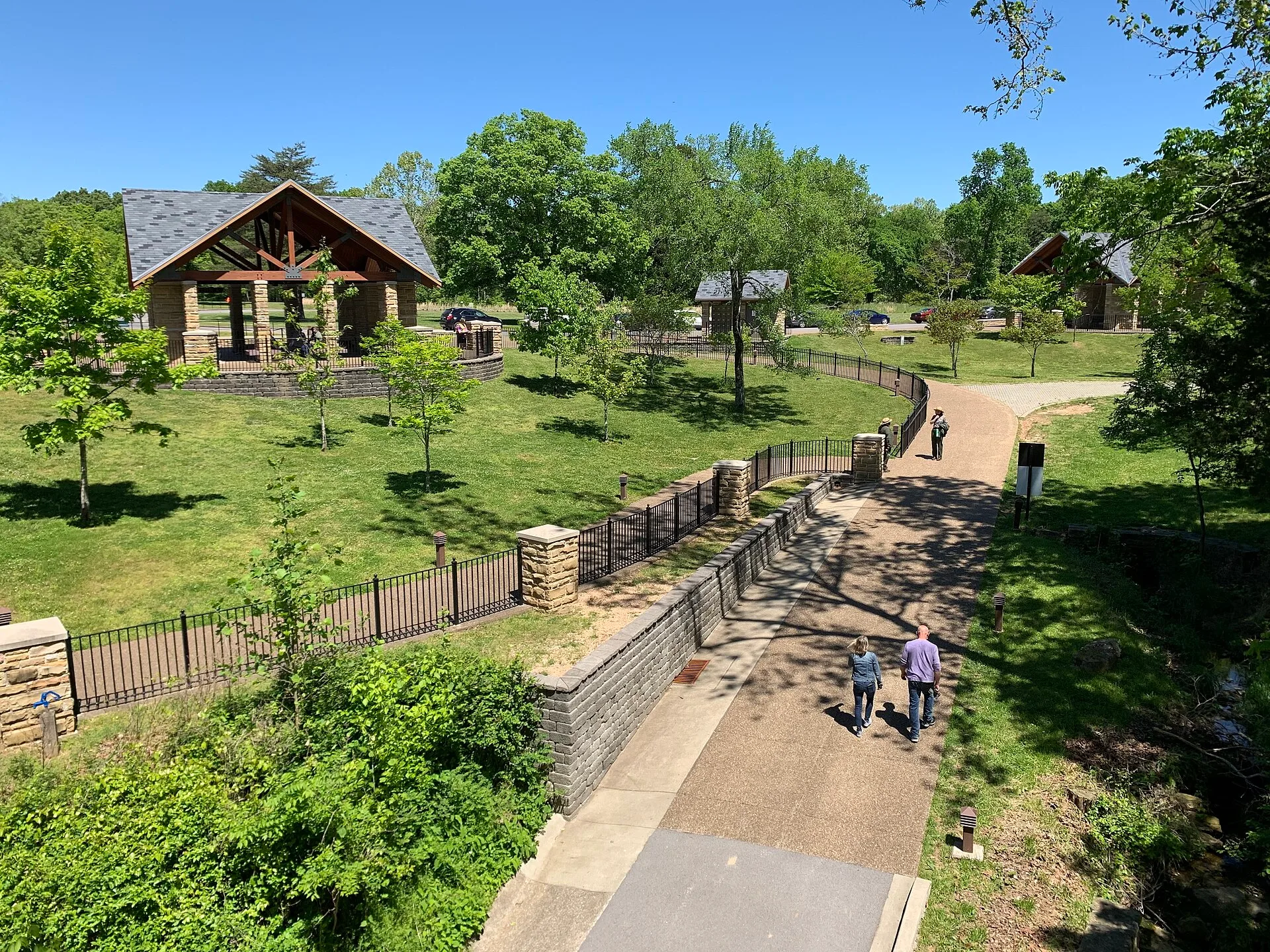 People walk along a trail behind the park visitor center. Miniature Diorama Reference from US National Parks: What Translates