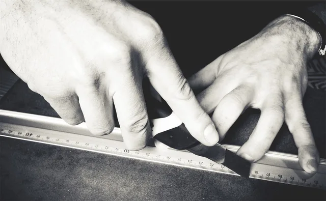 hands, xacto knife, blade, cutting. The supplies a book nook kit leaves out and the order to buy them first: blade, glue, paint, light, sanding sticks